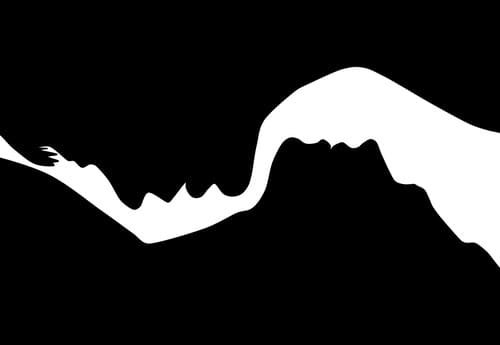 Schwarz-weiß Bild. Ein Männer Gesicht und ein Frauengesicht übereinander